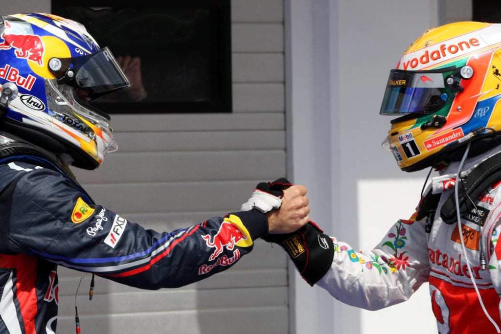 Sebastian Vette and Lewis Hamilton pictured in 2011 © XPB Images