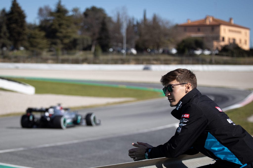 George Russell of Williams Racing watches Lewis Hamilton in his Mercedes © XPB Images